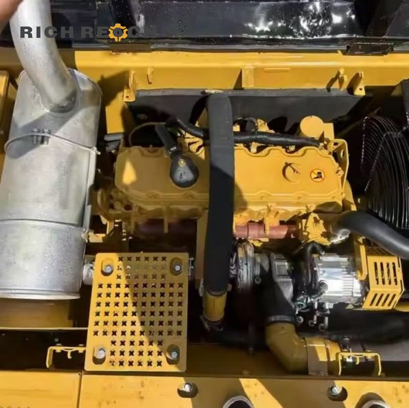 Rear view of a 2021 Caterpillar 325C excavator with 500 hours, listed for $30,800
